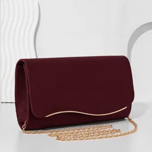 Luxury velvet evening bag with gold chain strap, elegant burgundy clutch for women weddings.