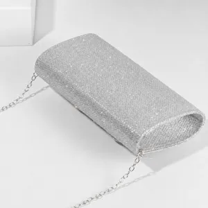 Silver glitter evening bag for women, elegant diamond clutch with chain for party events.