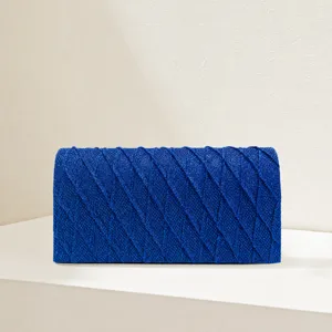 Elegant blue glitter pleated clutch bag, stylish diamond pattern evening handbag for women.