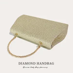 Elegante goldene Glitzer-Abendtasche mit stilvollem Metallgriff für elegante Partys.