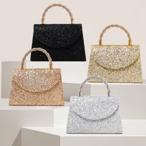 Elegant glitter evening handbag with dazzling rhinestone handle, perfect party purse for women.