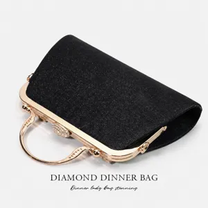 Elegant black glitter evening clutch bag with gold metal frame and sparkling rhinestone clasp for women.