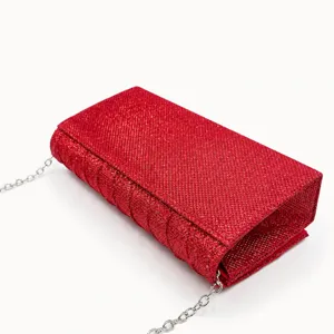 Stunning red glitter evening clutch bag with silver chain strap for women party events.