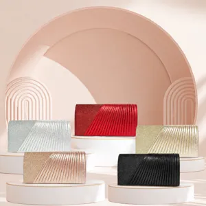Women's evening clutch bag with sparkling glitter and stylish pleated design for party.