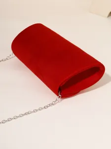 Red velvet evening bag with silver chain strap, elegant fashion shoulder handbag for women.
