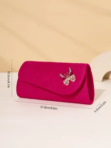 Elegant pink suede evening clutch bag with rhinestone butterfly decor for women parties.