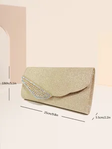 Elegante pochette da sera glitterata oro con dettagli in strass brillanti per feste ed eventi.
