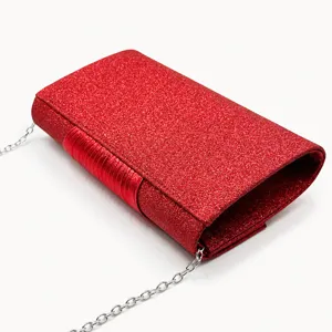 Red glitter evening clutch bag with chain strap, stylish pleated flap design for party banquets.