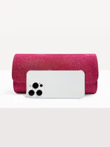 Detailed view of a stunning pink glitter evening clutch bag, perfect for weddings and parties.