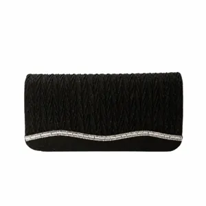 Women black glitter evening clutch bag with sparkling rhinestone wave design for party.