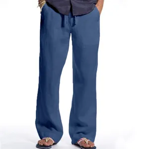 Detail of men's blue casual linen trousers featuring comfortable loose fit and adjustable drawstring.