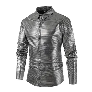 Detailed view of the shiny metallic long sleeve shirt, showcasing collar and button design.