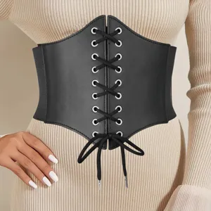 Close-up view of the black wide lace-up corset belt detailing metal eyelets and textured finish.