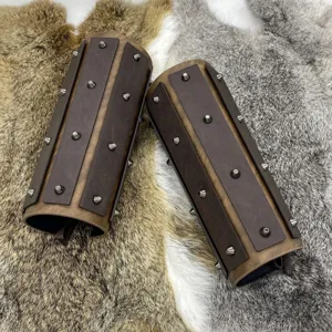 Medieval faux leather bracers with metal studs, perfect for knight cosplay and role play.