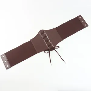 Detail view of brown medieval retro wide corset belt with lace-up front and buttons.