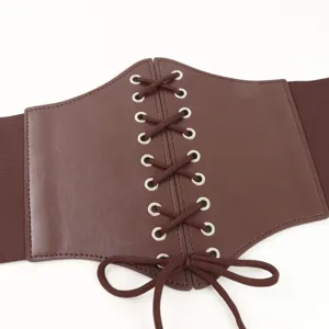 Detailed shot of medieval vintage brown corset belt with lace-up front and elastic sides.