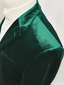 Men green velvet suit jacket detail, elegant formal blazer for wedding banquet and party wear.