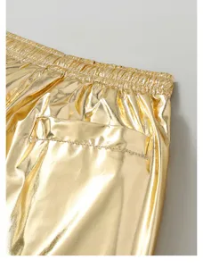 Metallic gold shiny trousers detail view, elastic waistband and back pocket, stylish party wear.
