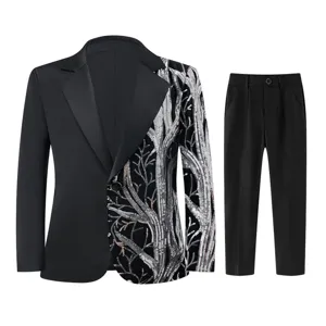 Close-up detail of boys black blazer featuring intricate silver sequin tree branch embroidery.