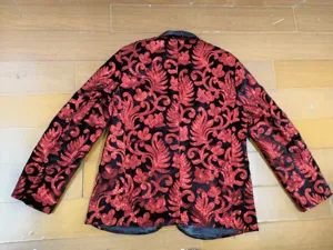 Men sequin velvet blazer detail, red floral embroidery design for stage performance parties.