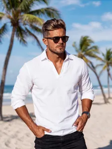 Details of the men's solid white V-neck long sleeve shirt on beach resort background.