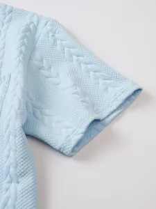 Men's casual knit short sleeve t-shirt detail, waffle jacquard texture, light blue color.