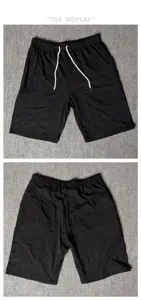 Men's casual solid color shorts with comfortable elastic drawstring waistband detail.