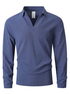 Men's solid color long sleeve henley shirt detail showing collar and soft fabric texture.