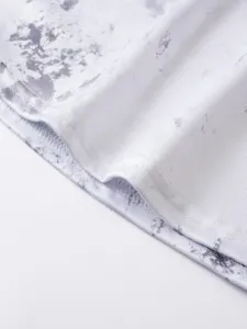 Close-up detail of men's breathable sports tank top fabric with grey marble pattern.