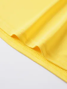 Close-up detail of yellow breathable athletic tank top mesh fabric and clean stitching.