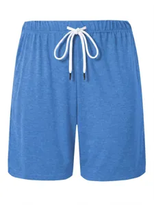 Men's casual textured blue drawstring shorts with vintage washed look and loose straight fit.