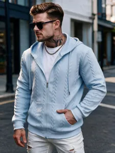 Detailed shot of a stylish light blue cable knit zip-up hoodie for men outdoors nicely.