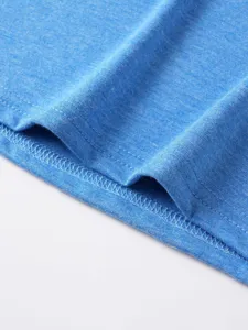 Close-up detail of blue men's casual t-shirt fabric texture and fine stitching craftsmanship.