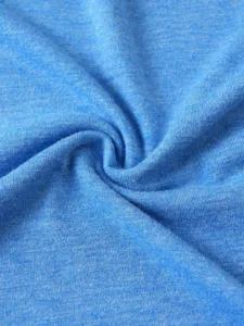 Close-up detail of soft blue heathered fabric texture for men casual summer t-shirts.