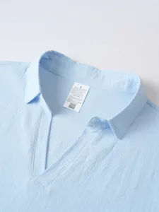Light blue linen blend men shirt collar detail, casual v-neck pullover neckline texture view.