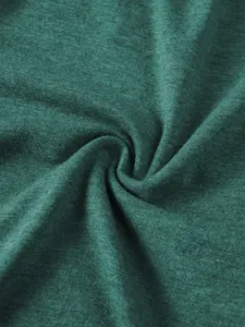 Detailed view of men's casual cotton linen long sleeve shirt fabric in dark green color.