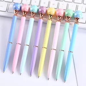 Set of eight creative pastel metal ballpoint pens with pearlescent ball tops for gift