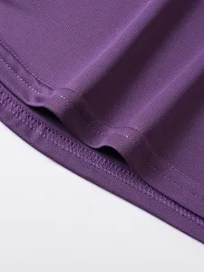Close-up detail of purple breathable mesh fabric, neat stitching and fine workmanship.
