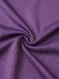 Detailed view of breathable purple mesh sports fabric, lightweight and perfect for activewear.