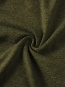 Close-up view of solid army green cotton knit fabric texture, fine textile detail shot.