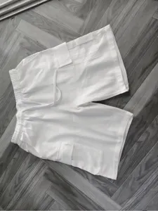 White casual cargo shorts for men, featuring elastic drawstring waist and multi pockets.