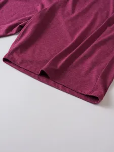 Men's casual polo shirt soft heather fabric texture and fine stitch detail close up.