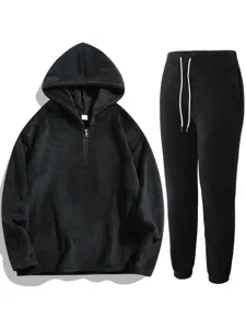 Men's solid black fleece half zip hoodie and sweatpants set for cozy autumn winter.