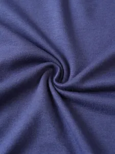 Fabric detail of men's casual solid color t-shirt showing soft knitted texture.