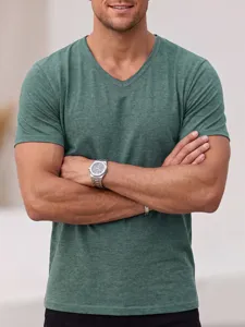 Close-up detail view of men's casual V-neck short sleeve t-shirt in solid green color.
