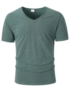 Close-up detail of casual green V-neck short sleeve t-shirt fabric and collar design.