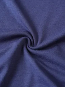 Primo piano della texture del tessuto di abbigliamento maschile con maglia morbida.