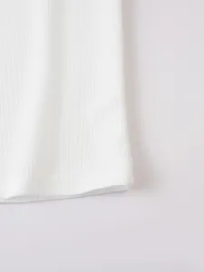 White waffle knit fabric detail, premium texture and breathable design for casual wear comfort.