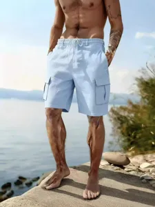Men casual cotton linen cargo shorts with elastic drawstring waist for summer beach wear.