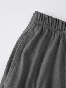 Men casual shorts detail shot, dark grey fabric elastic waistband and pocket design.